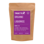 Organic Liquorice Tea in brown kraft packaging with a purple label on the front.