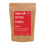 Organic Rooibos Tea product packaging. A red label placed on a brown kraft bag which is eco friendly.
