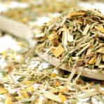 a herbal tea with lemon and ginger pieces