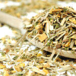 a herbal tea with lemon and ginger pieces