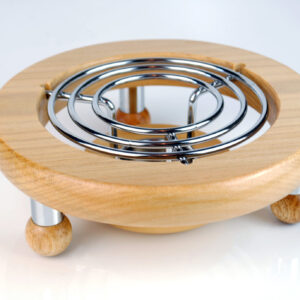 a teapot burner with a candle light