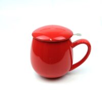 red teacup with infuser