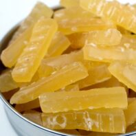 candied ginger sticks. Glazed ginger sticks in a bowl