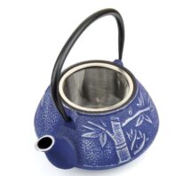 pattern of a forest on cast iron teapot