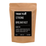 Strong Breakfast Tea in a brown kraft packaging with a black label. The bag pictured is resealable for loose leaf tea.